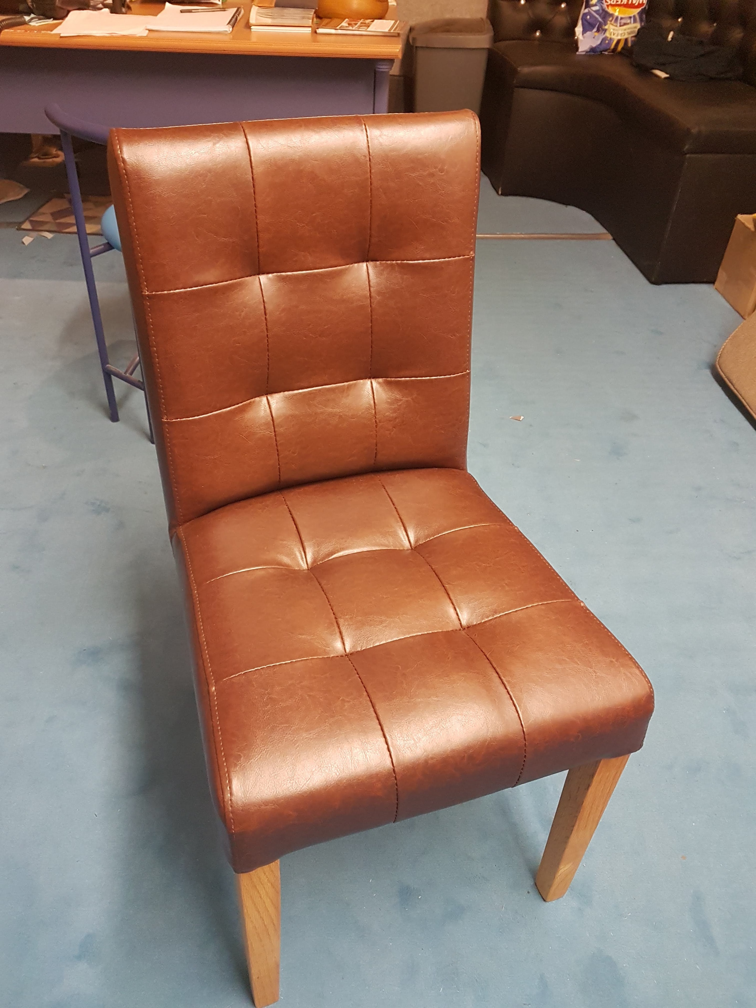 Tan leather lounge chair