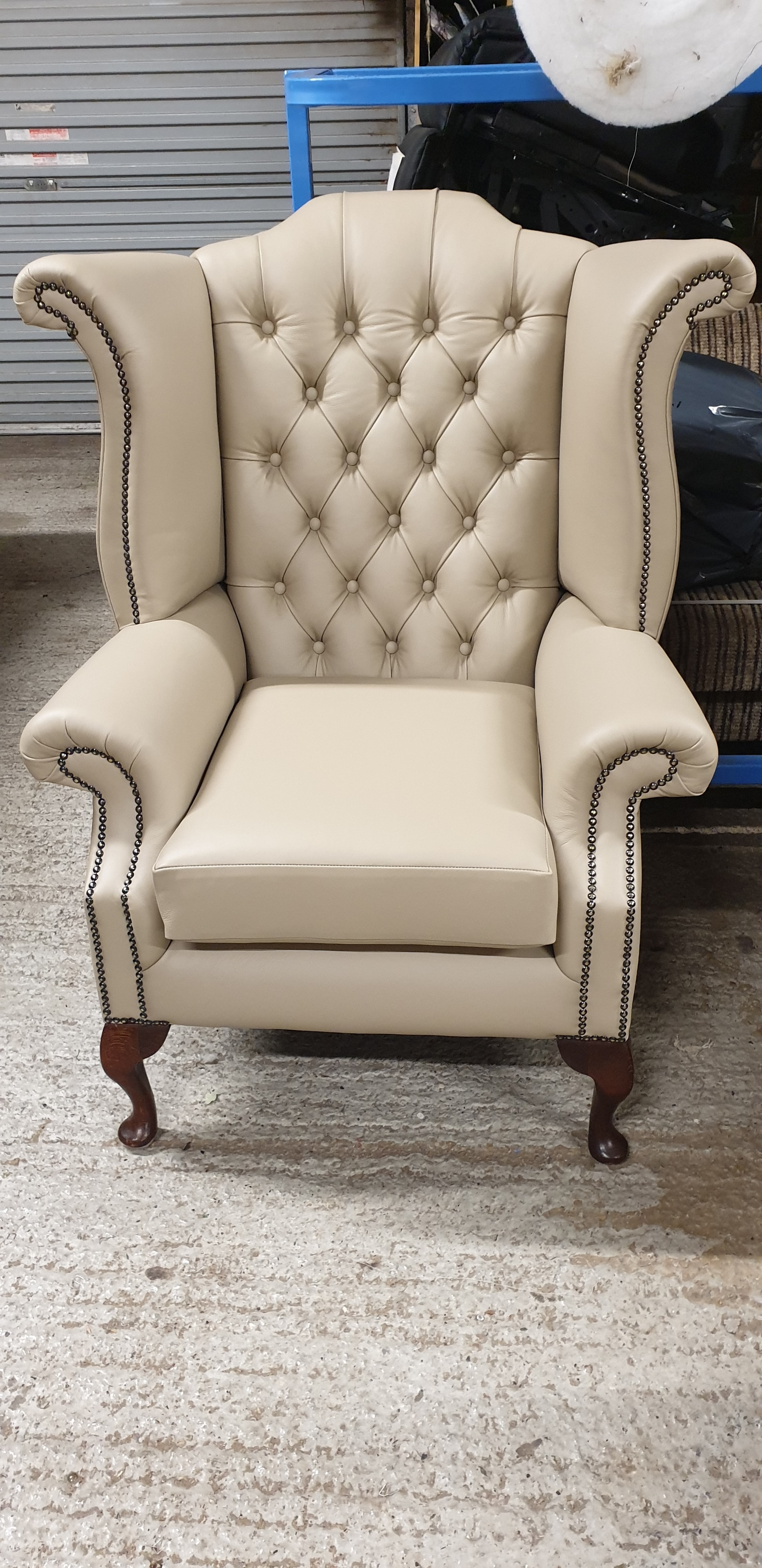 Cream tufted wingback